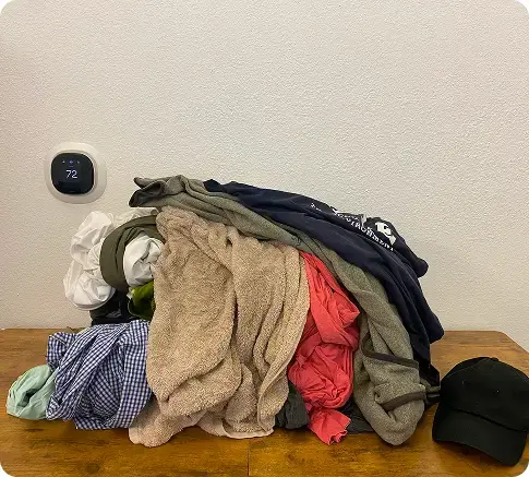 Assorted clothes folded representing about 20lbs of laundry